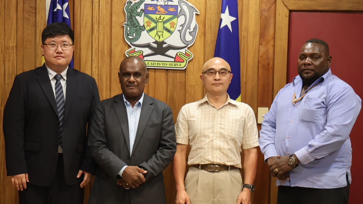 Prime Minister Hon. Manele MP, Tony and Vincent of SINOMACH and MRD Deputy Secretary Technical George Balairamo.